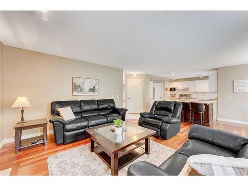 28 Simcrest Point Sw, Calgary, AB - Indoor Photo Showing Living Room