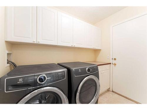 28 Simcrest Point Sw, Calgary, AB - Indoor Photo Showing Laundry Room