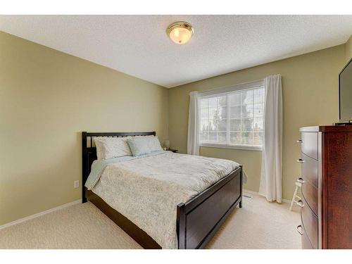 28 Simcrest Point Sw, Calgary, AB - Indoor Photo Showing Bedroom