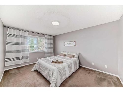 63 Evanston Rise Nw, Calgary, AB - Indoor Photo Showing Bedroom