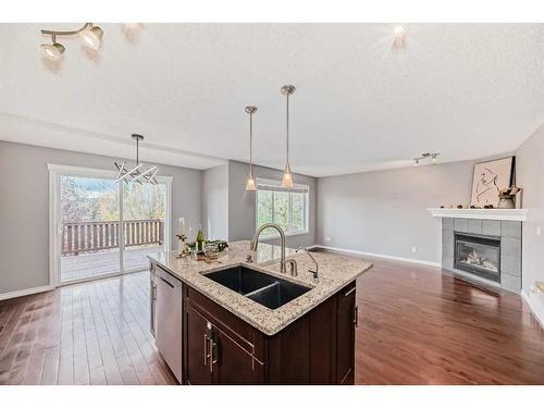 63 Evanston Rise Nw, Calgary, AB - Indoor Photo Showing Other Room With Fireplace