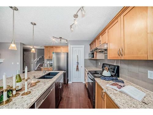 63 Evanston Rise Nw, Calgary, AB - Indoor Photo Showing Kitchen With Double Sink