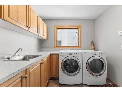 416 Scenic View Bay Nw, Calgary, AB - Indoor Photo Showing Laundry Room