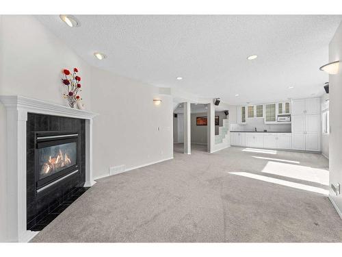 416 Scenic View Bay Nw, Calgary, AB - Indoor With Fireplace