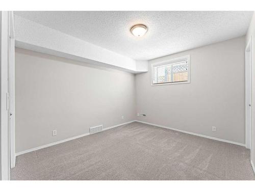 416 Scenic View Bay Nw, Calgary, AB - Indoor Photo Showing Other Room