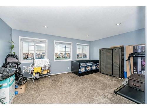 151 Saddlehorn Close Ne, Calgary, AB - Indoor Photo Showing Gym Room