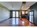 303-1736 13 Avenue Sw, Calgary, AB  - Indoor Photo Showing Kitchen With Stainless Steel Kitchen 