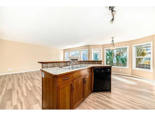 273 New Brighton Lane Se, Calgary, AB - Indoor Photo Showing Kitchen With Double Sink