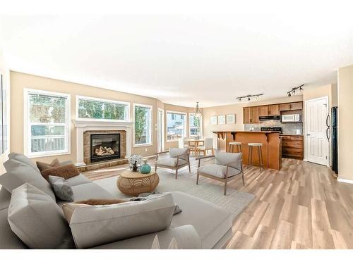 273 New Brighton Lane Se, Calgary, AB - Indoor Photo Showing Living Room With Fireplace