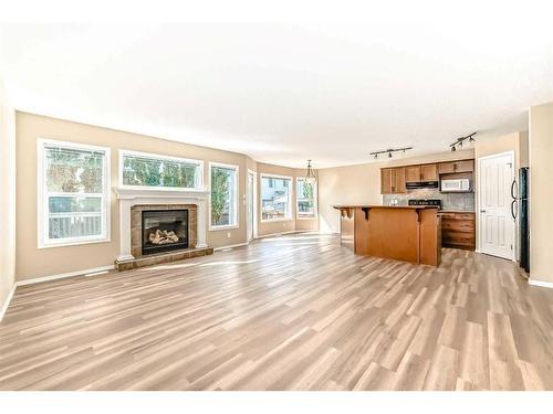 273 New Brighton Lane Se, Calgary, AB - Indoor With Fireplace