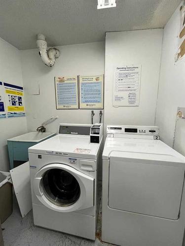 701-314 14 Street Nw, Calgary, AB - Indoor Photo Showing Laundry Room