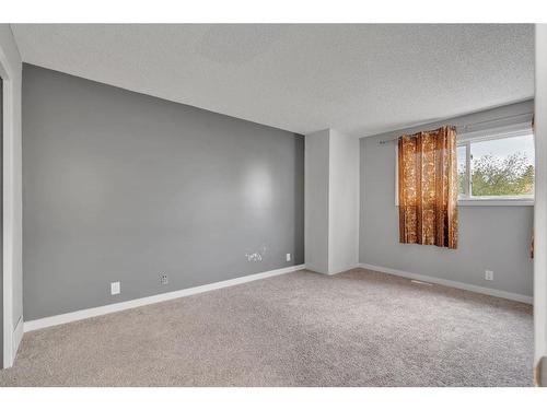 5-6408 4A Street Ne, Calgary, AB - Indoor Photo Showing Other Room