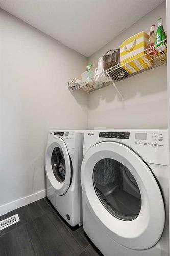 233 Calhoun Common Nw, Calgary, AB - Indoor Photo Showing Laundry Room