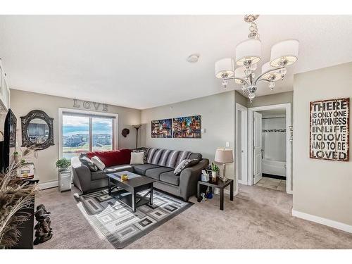 415-15 Saddlestone Way Ne, Calgary, AB - Indoor Photo Showing Living Room