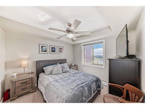 415-15 Saddlestone Way Ne, Calgary, AB - Indoor Photo Showing Bedroom