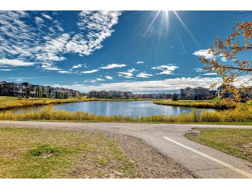 415-15 Saddlestone Way Ne, Calgary, AB - Outdoor With Body Of Water With View