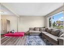 14 Falsby Way Ne, Calgary, AB  - Indoor Photo Showing Living Room 