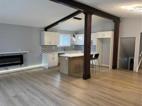 6320 Tregillus Street Nw, Calgary, AB - Indoor With Fireplace