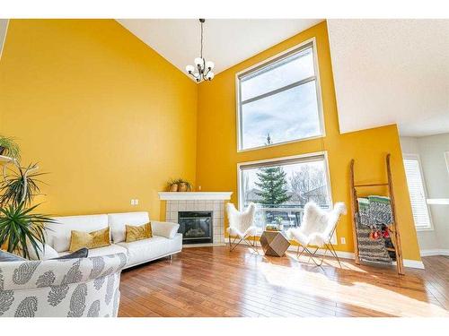 185 Arbour Stone Close Nw, Calgary, AB - Indoor Photo Showing Living Room With Fireplace