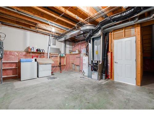 8-249 Ross Avenue, Cochrane, AB - Indoor Photo Showing Basement