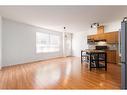 8-249 Ross Avenue, Cochrane, AB  - Indoor Photo Showing Kitchen 