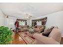 423 Whitehorn Place Ne, Calgary, AB  - Indoor Photo Showing Living Room 