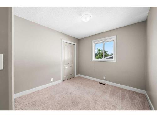 1031 Hammond Avenue, Crossfield, AB - Indoor Photo Showing Other Room