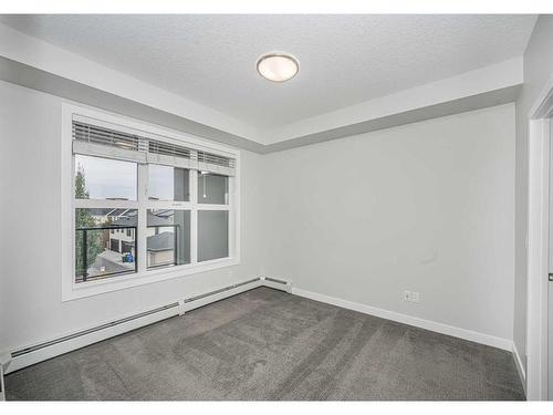 3320-95 Burma Star Road Sw, Calgary, AB - Indoor Photo Showing Other Room