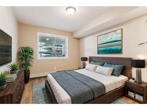 107-2000 Applevillage Court Se, Calgary, AB - Indoor Photo Showing Bedroom