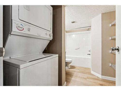 107-2000 Applevillage Court Se, Calgary, AB - Indoor Photo Showing Laundry Room