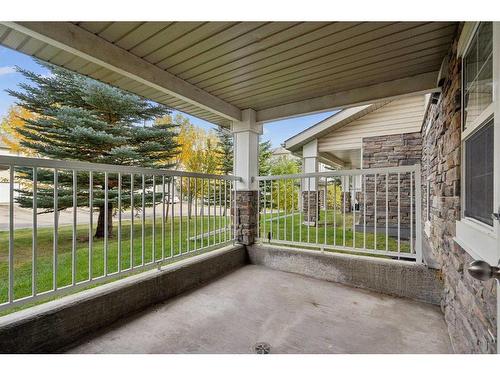 107-2000 Applevillage Court Se, Calgary, AB - Outdoor With Deck Patio Veranda With Exterior