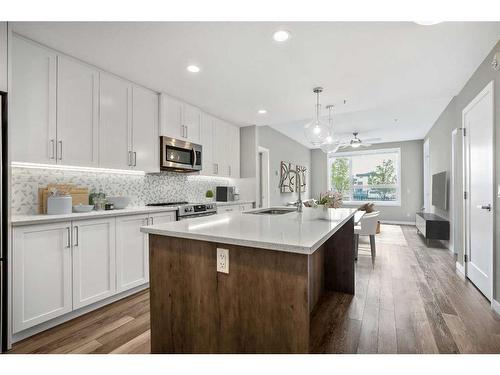 112-8530 8A Avenue Sw, Calgary, AB - Indoor Photo Showing Kitchen With Upgraded Kitchen