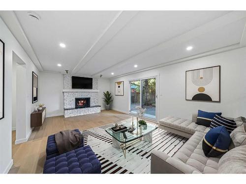 732 Willard Road Se, Calgary, AB - Indoor Photo Showing Living Room With Fireplace