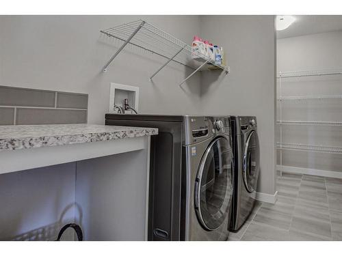 100 Sage Bluff Close Nw, Calgary, AB - Indoor Photo Showing Laundry Room