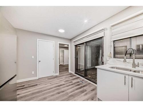 6848 Temple Drive Ne, Calgary, AB - Indoor Photo Showing Kitchen With Double Sink