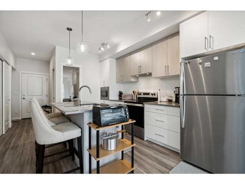 614-238 Sage Valley Common Nw, Calgary, AB - Indoor Photo Showing Kitchen With Upgraded Kitchen