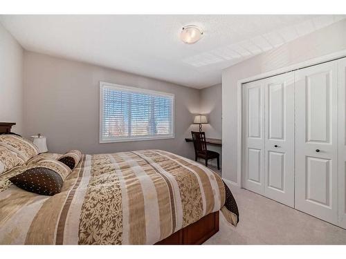 170 Crestmont Drive Sw, Calgary, AB - Indoor Photo Showing Bedroom