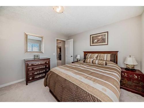 170 Crestmont Drive Sw, Calgary, AB - Indoor Photo Showing Bedroom