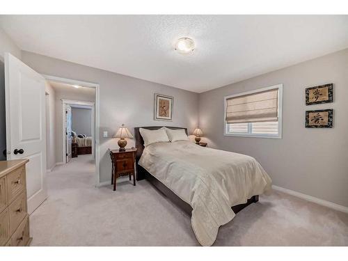 170 Crestmont Drive Sw, Calgary, AB - Indoor Photo Showing Bedroom