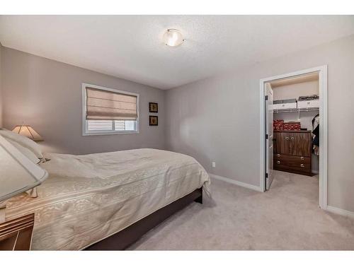 170 Crestmont Drive Sw, Calgary, AB - Indoor Photo Showing Bedroom