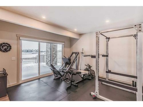 132 Marquis View Se, Calgary, AB - Indoor Photo Showing Gym Room