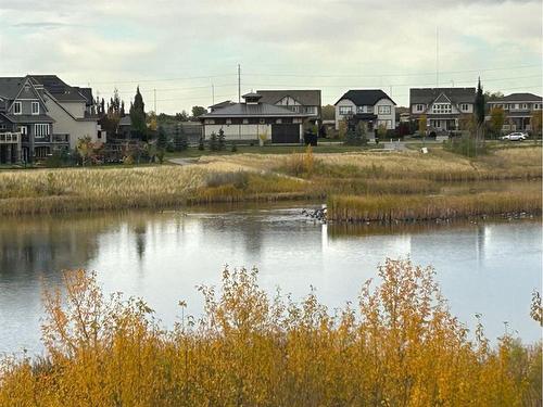 132 Marquis View Se, Calgary, AB - Outdoor With Body Of Water With View