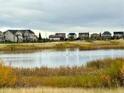 132 Marquis View Se, Calgary, AB - Outdoor With Body Of Water With View