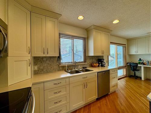 20 Ventura Road Ne, Calgary, AB - Indoor Photo Showing Kitchen With Double Sink