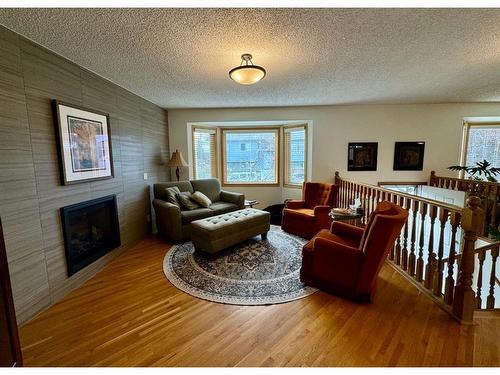 20 Ventura Road Ne, Calgary, AB - Indoor Photo Showing Living Room With Fireplace