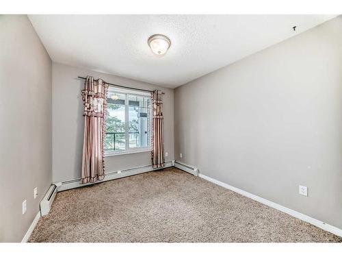 312-345 Rocky Vista Park Nw, Calgary, AB - Indoor Photo Showing Other Room