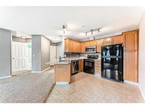 312-345 Rocky Vista Park Nw, Calgary, AB - Indoor Photo Showing Kitchen