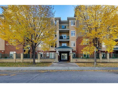 403-5720 2 Street Sw, Calgary, AB - Outdoor With Balcony With Facade