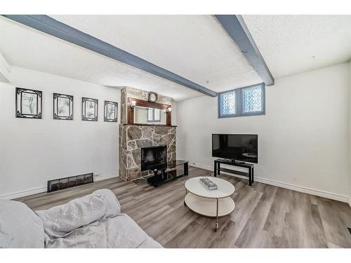 2906 17 Street Sw, Calgary, AB - Indoor Photo Showing Living Room With Fireplace