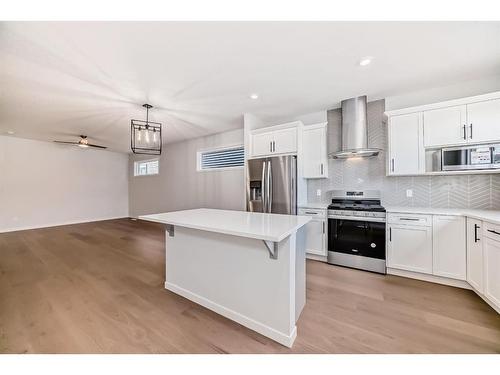 134 Wolf Creek Park Se, Calgary, AB - Indoor Photo Showing Kitchen With Stainless Steel Kitchen With Upgraded Kitchen